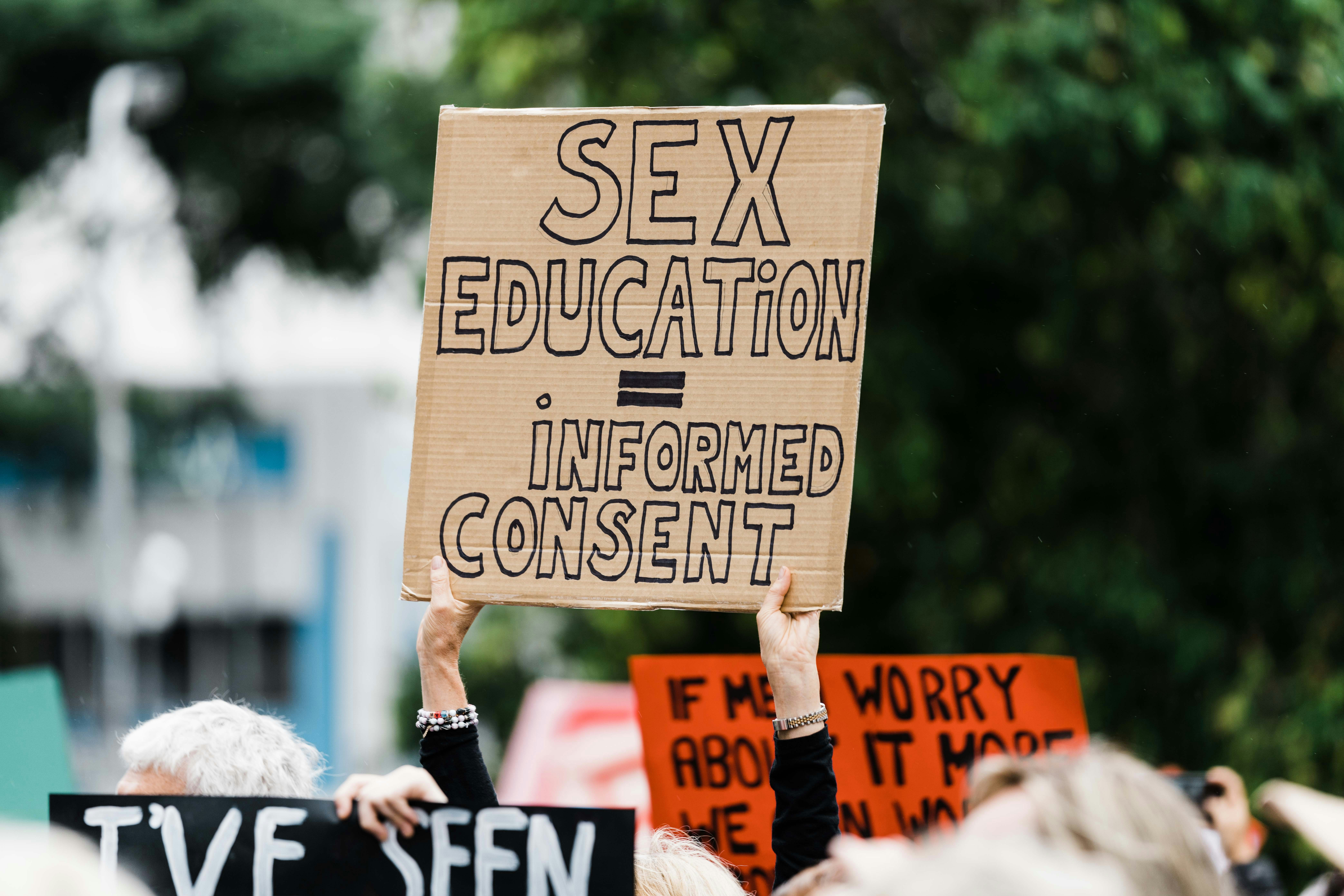 A placard that says Sex Education is equal to informed consent. Image by Stewart Munro on Unsplash